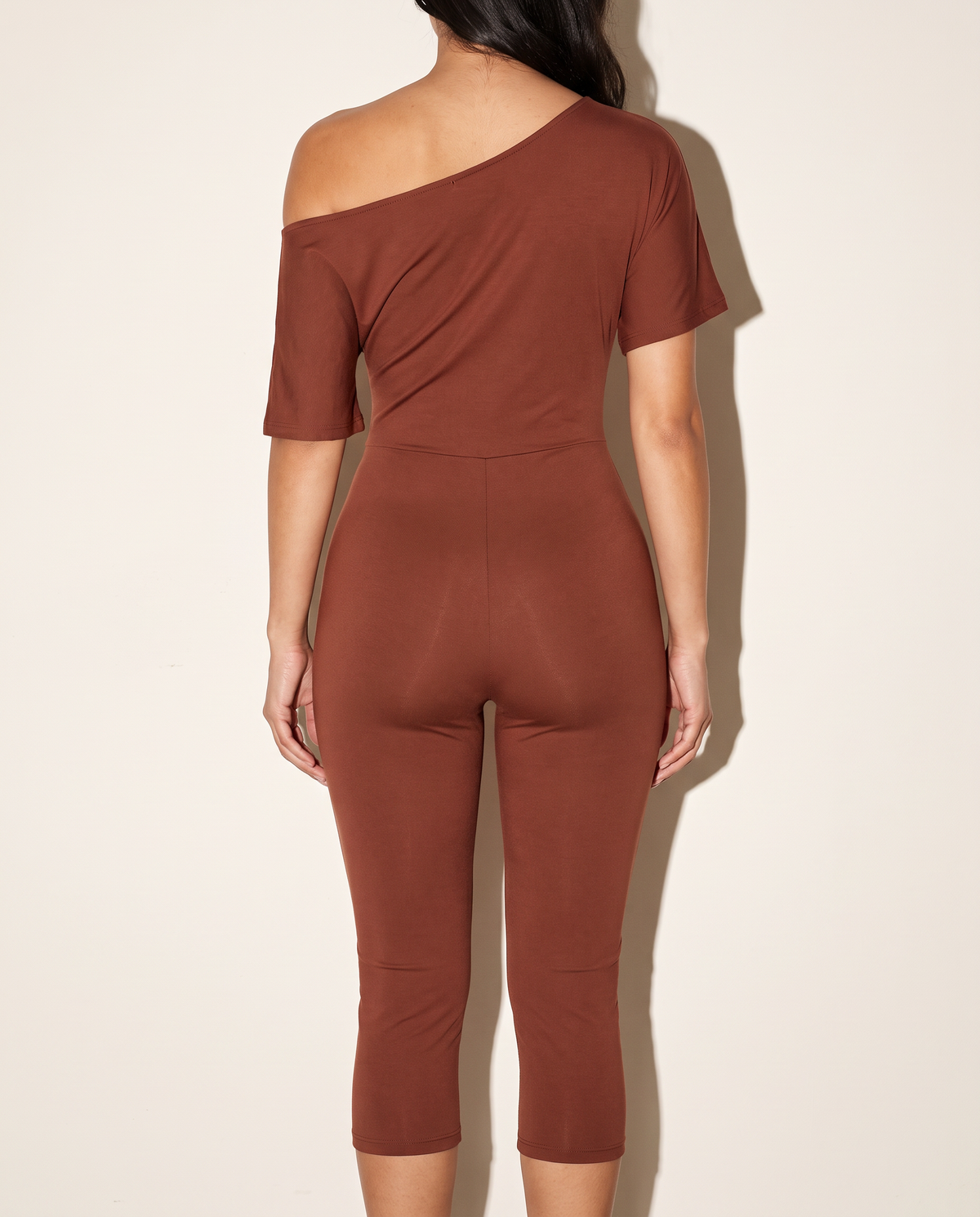 One Off Shoulder Capri Jumpsuit in Burgundy — back view