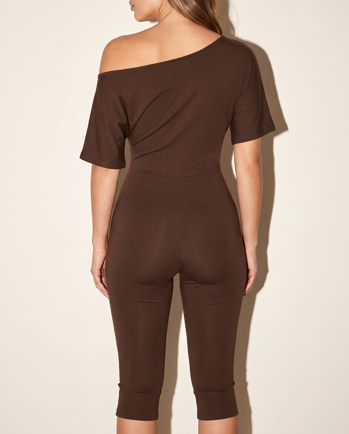 One Off Shoulder Capri Jumpsuit in DK BROWN — back view