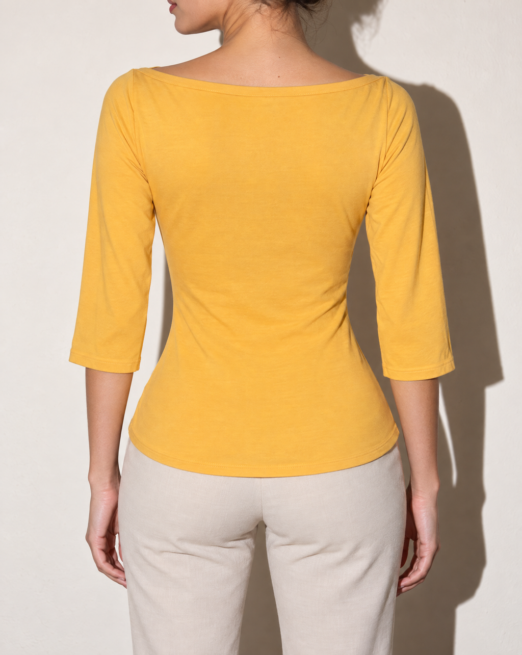Boat Neck Three-Quarter Sleeve Top in Mustard — back view