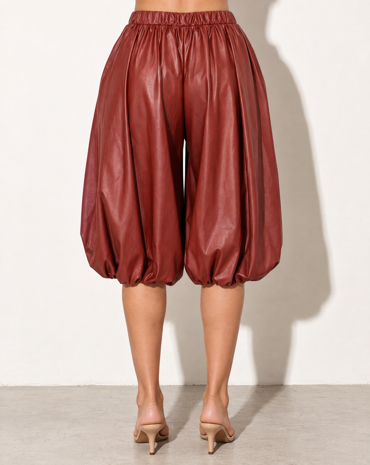 PU Bubble Capri Fashion Pants in Rust — back view