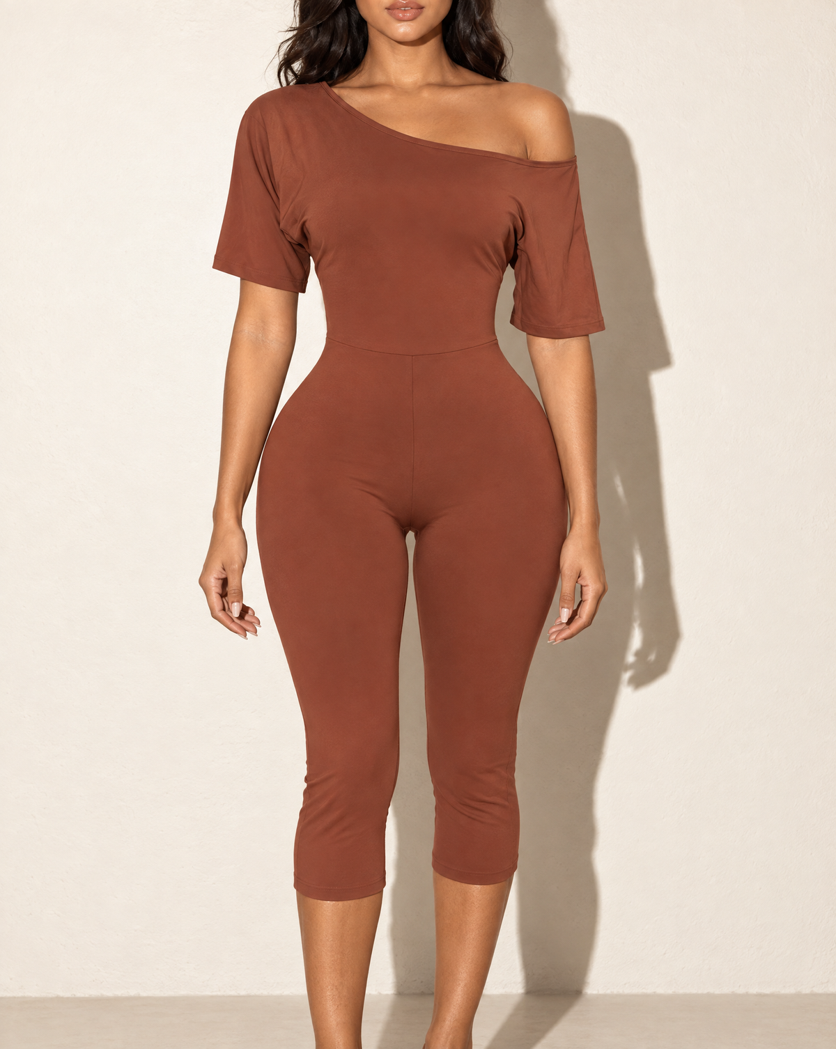 One Off Shoulder Capri Jumpsuit in Burgundy — front view