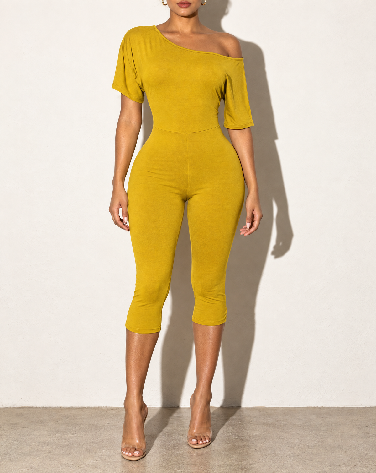 One Off Shoulder Capri Jumpsuit in Mustard — front view