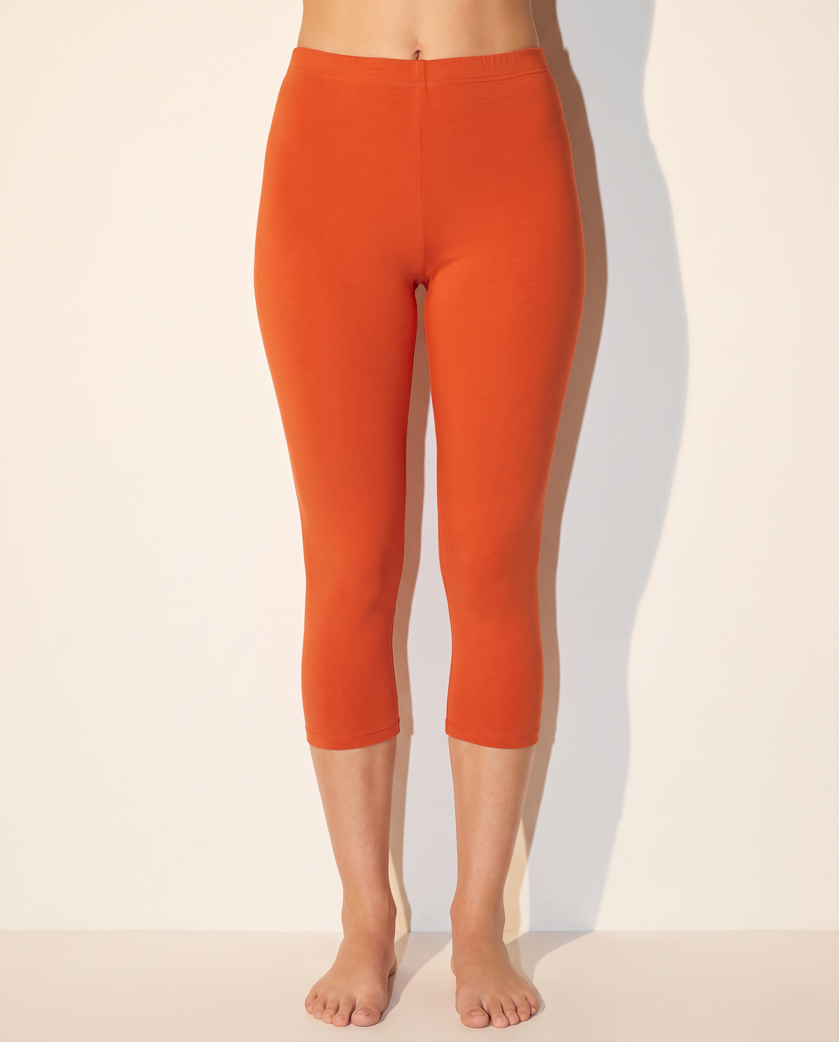 Elevated Basic Solid Capri Leggings in Rust — front view