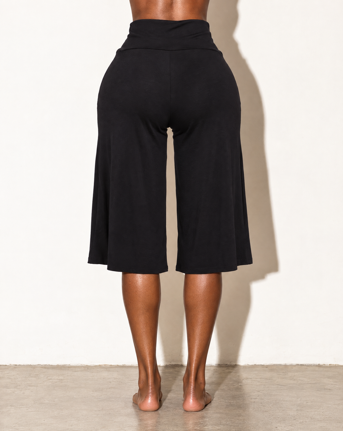 Capri Gaucho Pants in Black — back view
