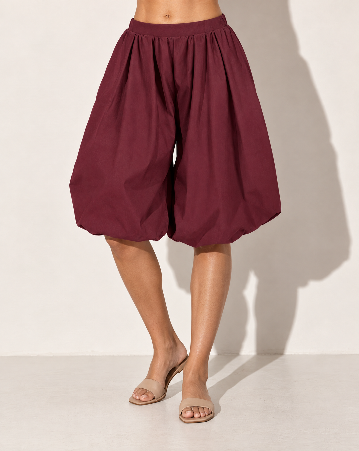 Wide Bubble Hem Capri Pants in Burgundy — alternate front view