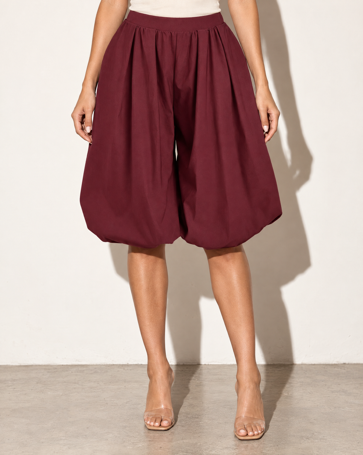Wide Bubble Hem Capri Pants in Burgundy — front view