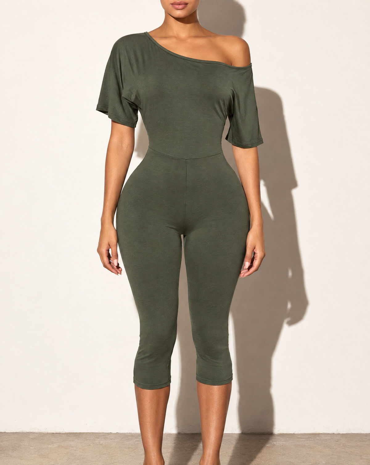 One Off Shoulder Capri Jumpsuit in Olive — front view
