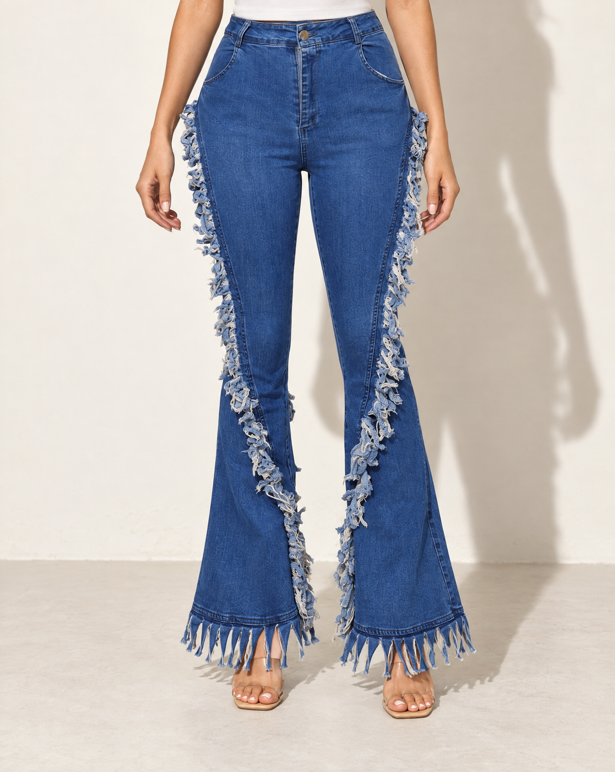 Distressed Fringe Denim Flared Pant in LT BLUE — front view