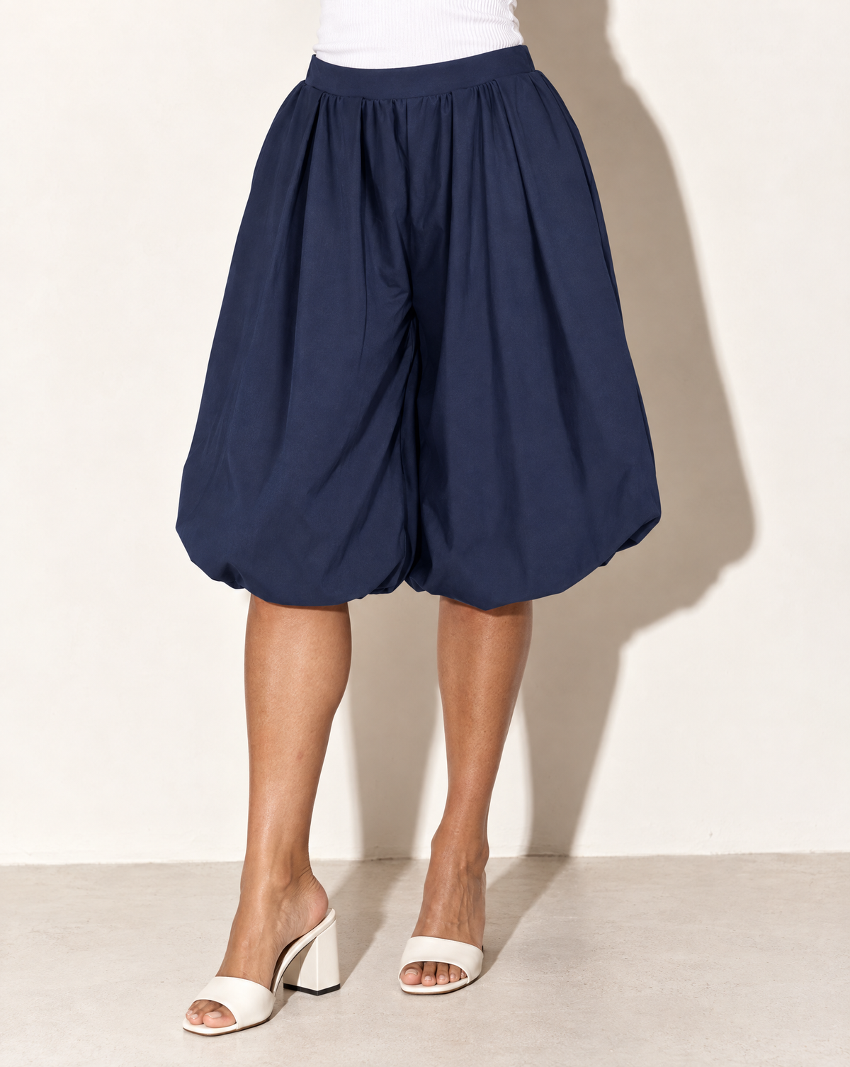 Wide Bubble Hem Capri Pants in Navy — alternate front view