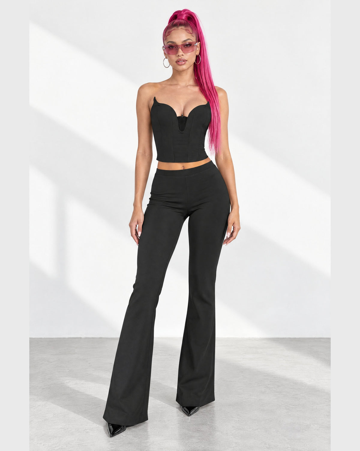 Corset Tube Top & Flare Pant Set in Black - front view on model | Muvin