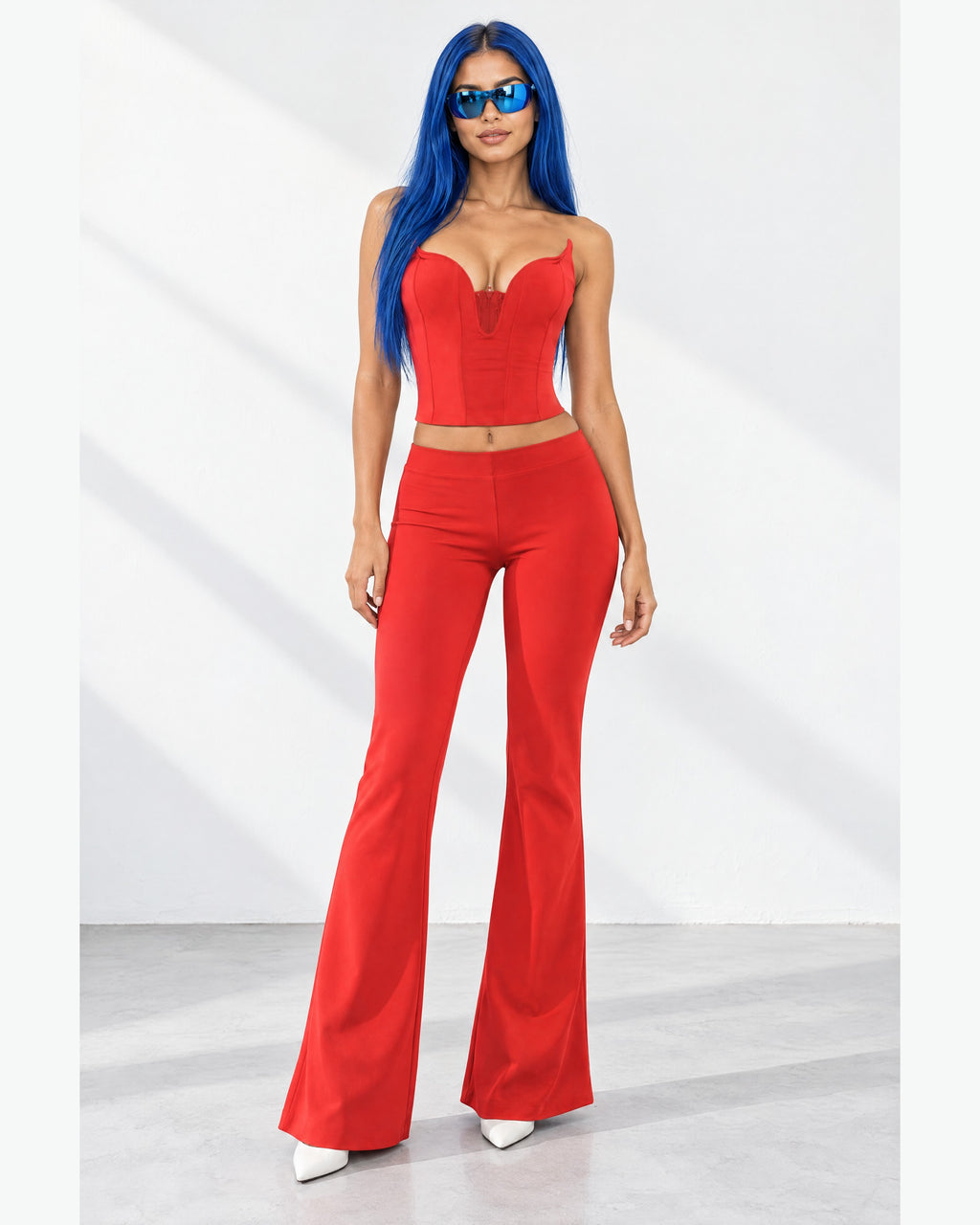 Corset Tube Top & Flare Pant Set in Red - front view on model | Muvin