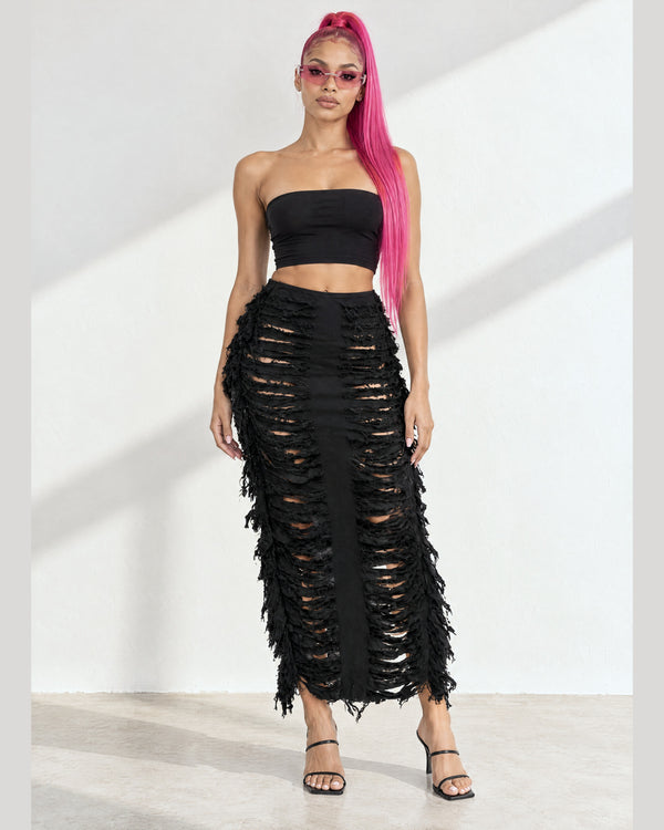 Distressed Denim Fringe Maxi Skirt in Black - front view on model | Muvin