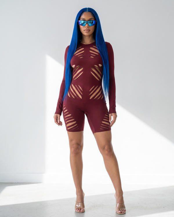 Die Cut Detailed Long Sleeve Open Back Romper in Burgundy - front view on model | Muvin