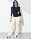 3/4 Sleeves Round Hem Top in Black - front view on model | Muvin