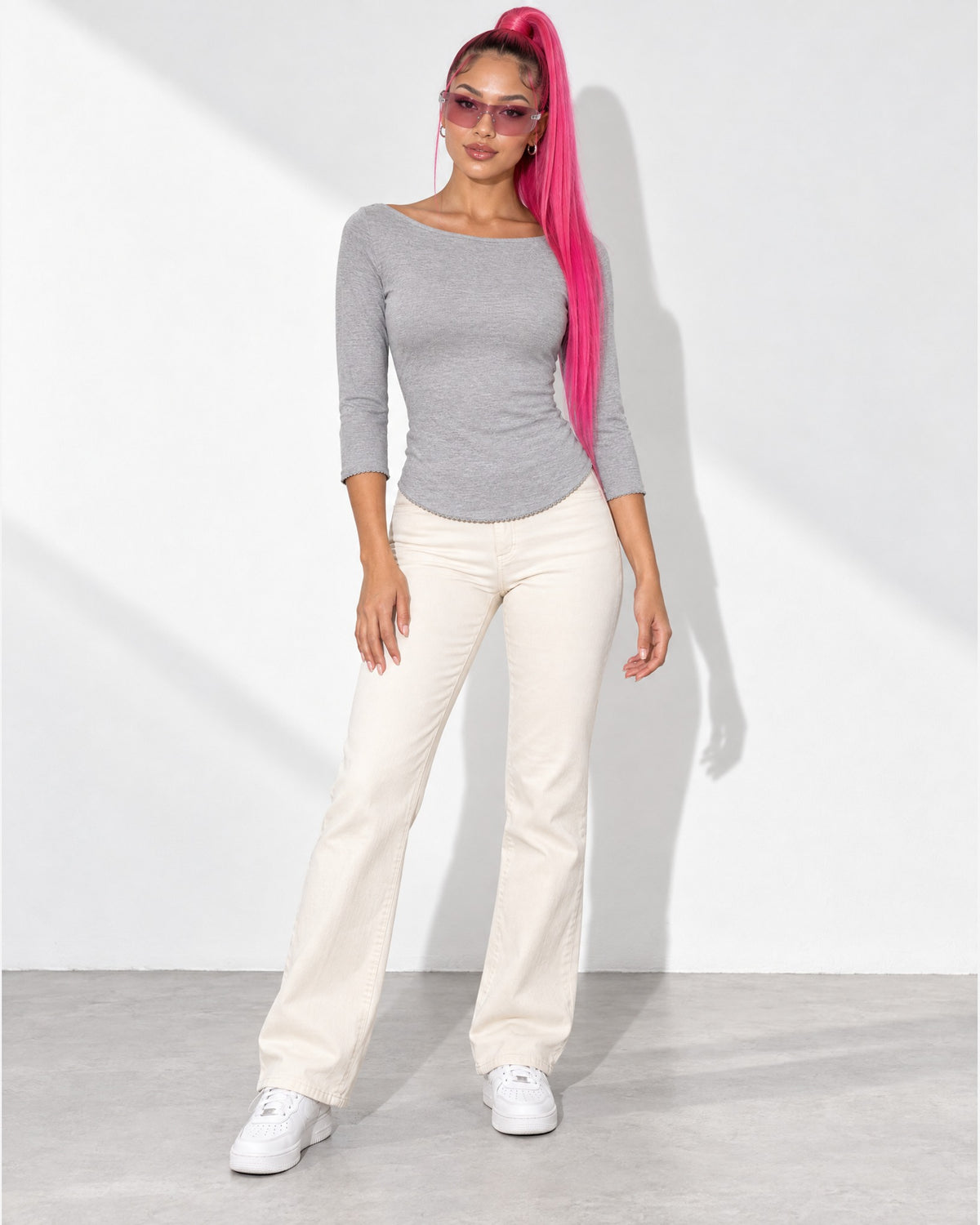 3/4 Sleeves Round Hem Top in H. Grey - front view on model | Muvin