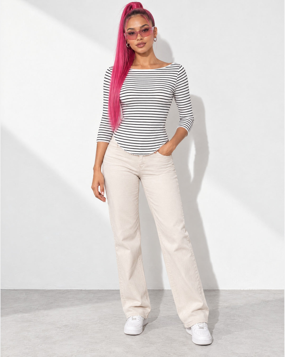3/4 Sleeves Round Hem Top in White/Black - front view on model | Muvin