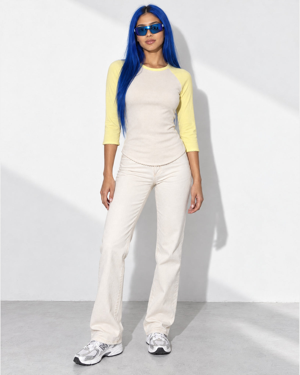 3/4 Raglan Sleeves Round Hem Top in Lemon/Cream - front view on model | Muvin
