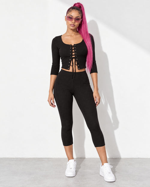 3/4 Sleeves Shoelace Closure Top & Capri Set in Black - front view on model | Muvin