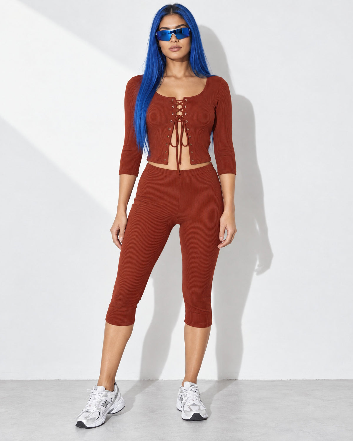 3/4 Sleeves Shoelace Closure Top & Capri Set in Rust - front view on model | Muvin