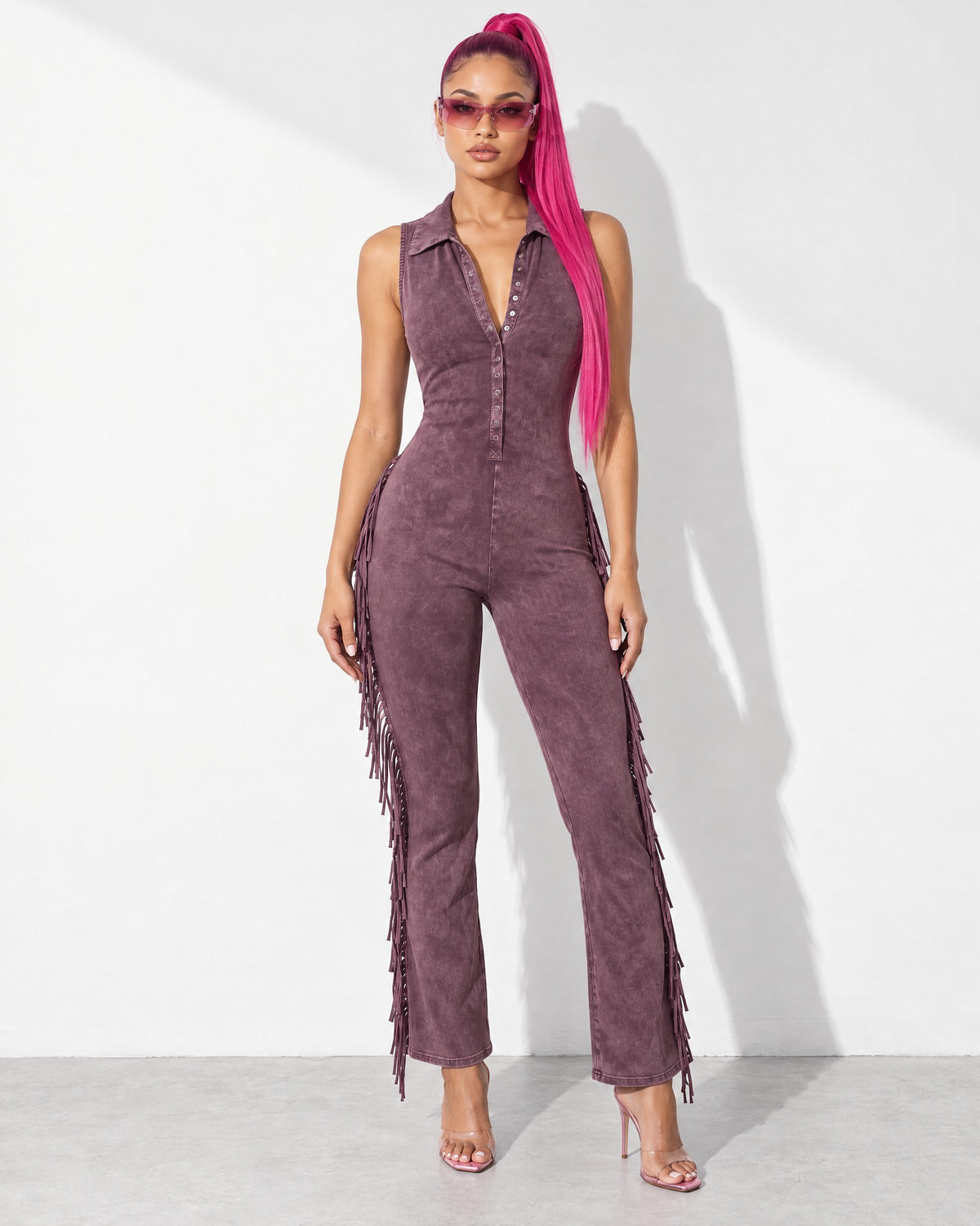 Mineral Washed Sleeveless Fringe Jumpsuit in Pink - front view on model | Muvin