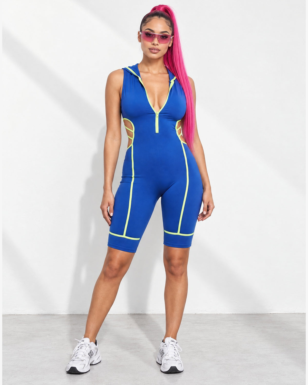 Semi Zip-Up Spaghetti Line Hoodie Romper in Royal Blue/N.Lime - front view on model | Muvin