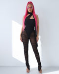 Mesh Contrast Ruched Jumpsuit in Black - front view on model | Muvin