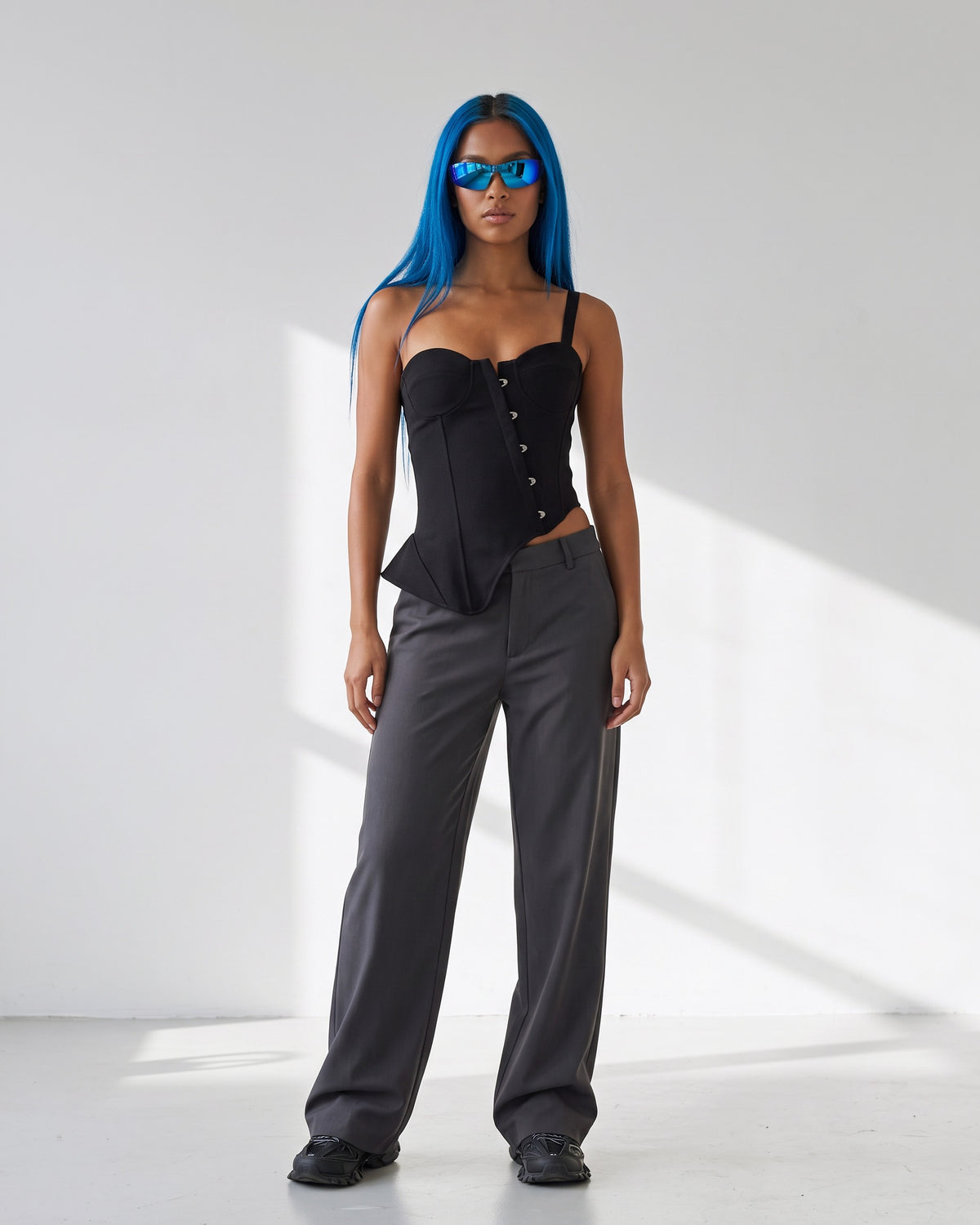 One Shoulder Asymmetrical Tank Top in Black - front view on model | Muvin